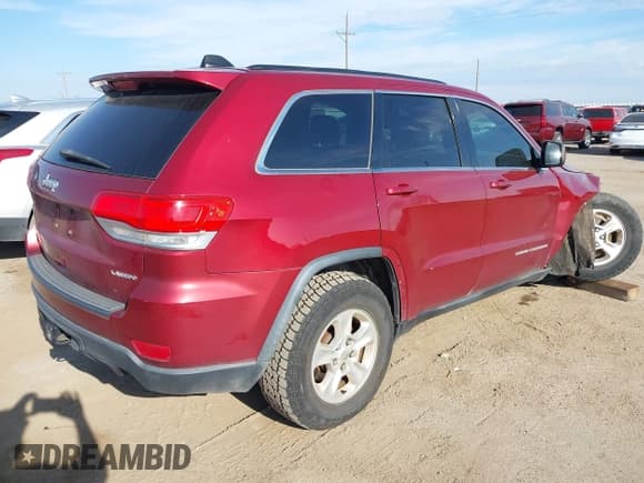 ✅ 2014 Jeep Grand Cherokee Laredo • VIN: 1C4RJFAG7EC299415 • Лот: 43252634. Опубликован ранее на IAAI с пробегом 141 242 миль. Бесплатный доступ к архиву аукционных продаж из США и подробный отчёт об истории автомобиля на DreamBid. Изображение 4.