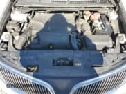 ✅ 2014 Lincoln MKS EcoBoost • VIN: 1LNHL9FT6EG609328 • Lot: 86884085. Listed on Copart with 174,975 mi. Free auction sales archive from the USA and detailed vehicle history report at DreamBid. Image 11.