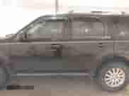 2010 Mercury Mariner Premier with VIN 4M2CN9HG2AKJ19690, listed as a IAAI auction lot 43221081 with 136,828 mi miles and . Bid and sale history available at DreamBid. Image 14.