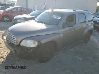 ✅ 2011 Chevrolet HHR LS • VIN: 3GNBAAFW5BS580940 • Lot: 42325855. Listed on Copart with 128,748 mi. Free auction sales archive from the USA and detailed vehicle history report at DreamBid. Image 1.