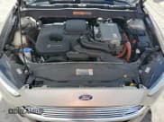 ✅ 2016 Ford Fusion S Hybrid • VIN: 3FA6P0UU7GR163196 • Lot: 82203315. Wystawiony na Copart z przebiegiem 166 598 mil. Bezpłatny archiwum sprzedaży aukcyjnych z USA i szczegółowy raport historii pojazdu na DreamBid. Zdjęcie 11.