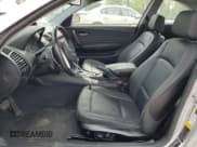 ✅ 2009 BMW 1 Series 128i • VIN: WBAUP73579VK74936 • Лот: 54558905. Опубликован ранее на Copart с пробегом 128 563 миль. Бесплатный доступ к архиву аукционных продаж из США и подробный отчёт об истории автомобиля на DreamBid. Изображение 7.