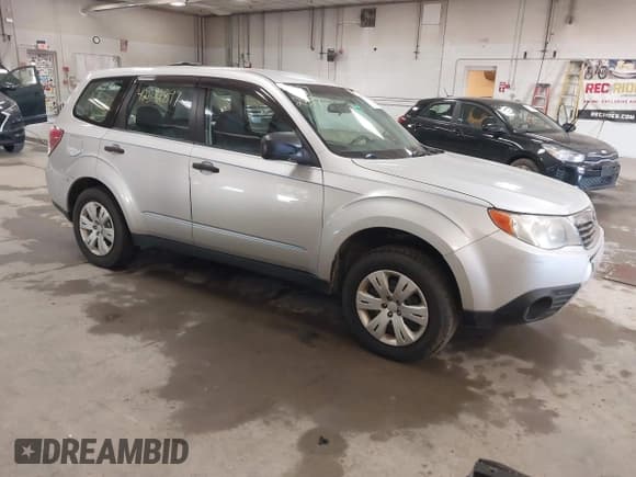 ✅ 2009 Subaru Forester X • VIN: JF2SH61649H772721 • Lot: 42572897. Listed on IAAI with 153,255 mi. Free auction sales archive from the USA and detailed vehicle history report at DreamBid. Image 1.