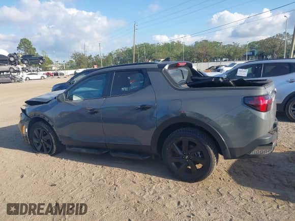 2024 Hyundai Santa Cruz Night Edition с VIN 5NTJCDDF4RH117762, выставлен на аукционе IAAI как лот 40815377 с пробегом 9 839 миль миль и . История ставок и продаж доступна на DreamBid. Изображение 14.