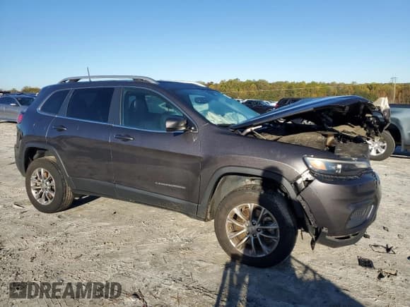 ✅ 2021 Jeep Cherokee 80th Anniversary • VIN: 1C4PJMMX2MD141631 • Lot: 90995015. Listed on Copart with 102,607 mi. Free auction sales archive from the USA and detailed vehicle history report at DreamBid. Image 4.