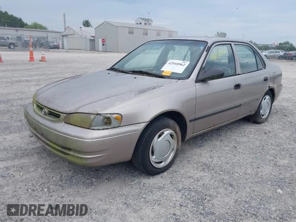 ✅ 1999 Toyota Corolla VE • VIN: 2T1BR12E3XC246635 • Lot: 42910962. Listed on IAAI with 252,704 mi. Free auction sales archive from the USA and detailed vehicle history report at DreamBid. Image 2.