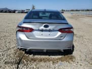 ✅ 2022 Toyota Camry Hybrid Nightshade • VIN: 4T1G31AK7NU033150 • Лот: 84897285. Опубликован ранее на Copart с пробегом 210 059 миль. Бесплатный доступ к архиву аукционных продаж из США и подробный отчёт об истории автомобиля на DreamBid. Изображение 6.