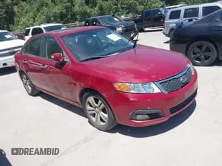 ✅ 2009 Kia Optima SX • VIN: KNAGE224395362896 • Lot: 42823175. Wystawiony na IAAI z przebiegiem 186 242 mil. Bezpłatny archiwum sprzedaży aukcyjnych z USA i szczegółowy raport historii pojazdu na DreamBid. Zdjęcie 1.