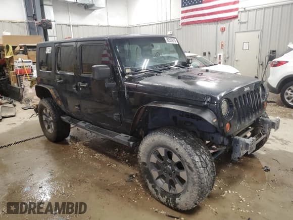 ✅ 2009 Jeep Wrangler Unlimited Sahara • VIN: 1J4GA59159L754330 • Лот: 80539615. Опубликован ранее на Copart с пробегом 221 621 миль. Бесплатный доступ к архиву аукционных продаж из США и подробный отчёт об истории автомобиля на DreamBid. Изображение 4.
