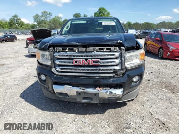 ✅ 2015 GMC Canyon 2WD SLT • VIN: 1GTG5CE3XF1269162 • Lot: 56463315. Wystawiony na Copart z przebiegiem 82 027 mil. Bezpłatny archiwum sprzedaży aukcyjnych z USA i szczegółowy raport historii pojazdu na DreamBid. Zdjęcie 5.