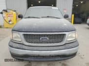 ✅ 1999 Ford F-150 • VIN: 1FTRF17W1XKA13215 • Lot: 67721245. Wystawiony na Copart z przebiegiem Nie podano. Bezpłatny archiwum sprzedaży aukcyjnych z USA i szczegółowy raport historii pojazdu na DreamBid. Zdjęcie 5.