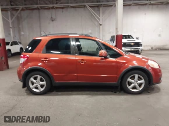 ✅ 2007 Suzuki SX4 • VIN: JS2YB413975100694 • Лот: 42336282. Опубликован ранее на IAAI с пробегом 150 270 миль. Бесплатный доступ к архиву аукционных продаж из США и подробный отчёт об истории автомобиля на DreamBid. Изображение 13.