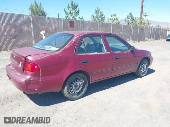 ✅ 2000 Toyota Corolla CE • VIN: 1NXBR12E0YZ414599 • Lot: 40203047. Wystawiony na IAAI z przebiegiem 192 914 mil. Bezpłatny archiwum sprzedaży aukcyjnych z USA i szczegółowy raport historii pojazdu na DreamBid. Zdjęcie 4.