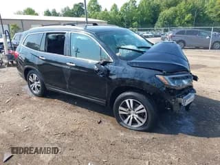 ✅ 2016 Honda Pilot EX-L • VIN: 5FNYF6H7XGB121975 • Lot: 42420267. Listed on IAAI with 141,568 mi. Free auction sales archive from the USA and detailed vehicle history report at DreamBid. Image 1.
