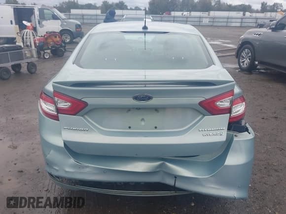 ✅ 2014 Ford Fusion Titanium Hybrid • VIN: 3FA6P0RU8ER350016 • Lot: 43532622. Listed on IAAI with 87,458 mi. Free auction sales archive from the USA and detailed vehicle history report at DreamBid. Image 6.