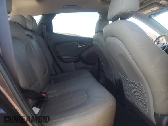 2014 Hyundai Tucson SE z VIN KM8JU3AG0EU795228, wystawiony jako Copart lot #69202565 z przebiegiem 138 146 mil mil oraz Czysty tytuł • Clean title. Historia ofert i sprzedaży dostępna na DreamBid. Obrazek 11.