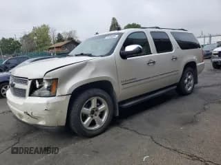 ✅ 2011 Chevrolet Suburban LTZ • VIN: 1GNSKKE3XBR223816 • Lot: 70764605. Listed on Copart with 166,032 mi. Free auction sales archive from the USA and detailed vehicle history report at DreamBid. Image 1.