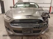 ✅ 2014 Ford Fusion SE • VIN: 3FA6P0H92ER140976 • Lot: 43676699. Listed on IAAI with 108,489 mi. Free auction sales archive from the USA and detailed vehicle history report at DreamBid. Image 6.