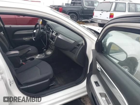 ✅ 2009 Chrysler Sebring Touring • VIN: 1C3LC56B49N531295 • Lot: 43859549. Listed on IAAI with 244,776 mi. Free auction sales archive from the USA and detailed vehicle history report at DreamBid. Image 5.