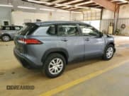 ✅ 2023 Toyota Corolla Cross L • VIN: 7MUAAABG9PV057635 • Lot: 52254885. Listed on Copart with 35,737 mi. Free auction sales archive from the USA and detailed vehicle history report at DreamBid. Image 3.