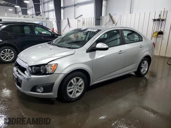✅ 2012 Chevrolet Sonic LS • VIN: 1G1JB5SH4C4212002 • Lot: 54702965. Listed on Copart with 96,388 mi. Free auction sales archive from the USA and detailed vehicle history report at DreamBid. Image 1.