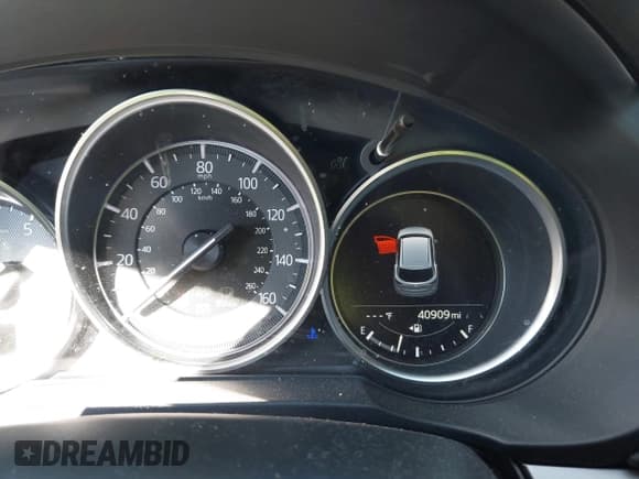 ✅ 2018 Mazda CX-5 Touring • VIN: JM3KFACM8J1432351 • Lot: 43385726. Listed on IAAI with 40,909 mi. Free auction sales archive from the USA and detailed vehicle history report at DreamBid. Image 7.