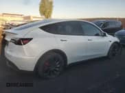 ✅ 2022 Tesla Model Y Performance • VIN: 7SAYGDEF8NF490332 • Lot: 71229425. Listed on Copart with 77,145 mi. Free auction sales archive from the USA and detailed vehicle history report at DreamBid. Image 3.