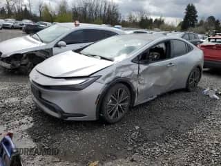 2024 Toyota Prius LE с VIN JTDADABU7R3013242, выставлен на аукционе Copart как лот 51542155 с пробегом 66 736 миль миль и Списание • Salvage title. История ставок и продаж доступна на DreamBid. Изображение 1.