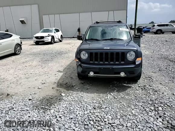 ✅ 2016 Jeep Patriot Latitude • VIN: 1C4NJRFB5GD511142 • Lot: 84433775. Listed on Copart with 115,800 mi. Free auction sales archive from the USA and detailed vehicle history report at DreamBid. Image 14.