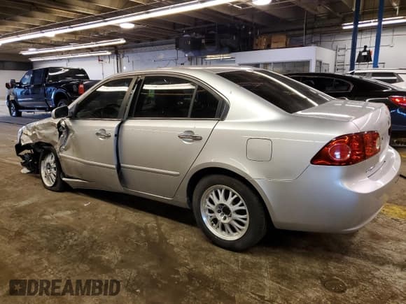 ✅ 2007 Kia Optima LX • VIN: KNAGE123475109066 • Lot: 41294354. Wystawiony na Copart z przebiegiem 134 888 mil. Bezpłatny archiwum sprzedaży aukcyjnych z USA i szczegółowy raport historii pojazdu na DreamBid. Zdjęcie 2.