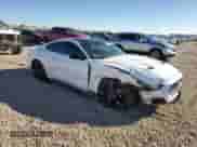 2022 Ford Mustang EcoBoost с VIN 1FA6P8TH5N5136355, выставлен на аукционе Copart как лот 87034355 с пробегом 39 968 миль миль и Списание • Salvage title. История ставок и продаж доступна на DreamBid. Изображение 4.