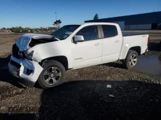 ✅ 2018 Chevrolet Colorado 4WD Z71 • VIN: 1GCGTDEN0J1107448 • Лот: 87057135. Опубликован ранее на Copart с пробегом 101 975 миль. Бесплатный доступ к архиву аукционных продаж из США и подробный отчёт об истории автомобиля на DreamBid. Изображение 1.