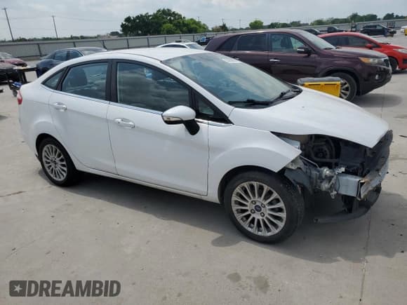 ✅ 2015 Ford Fiesta Titanium • VIN: 3FADP4CJXFM100952 • Lot: 53363555. Listed on Copart with 84,312 mi. Free auction sales archive from the USA and detailed vehicle history report at DreamBid. Image 4.
