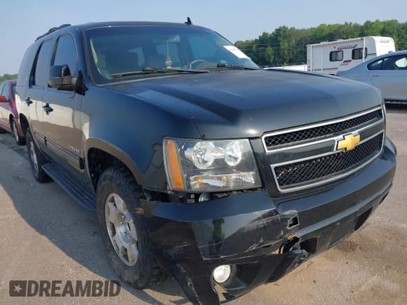 ✅ 2014 Chevrolet Tahoe LT • VIN: 1GNSCBE01ER235571 • Lot: 42403118. Listed on IAAI with 238,069 mi. Free auction sales archive from the USA and detailed vehicle history report at DreamBid. Image 6.