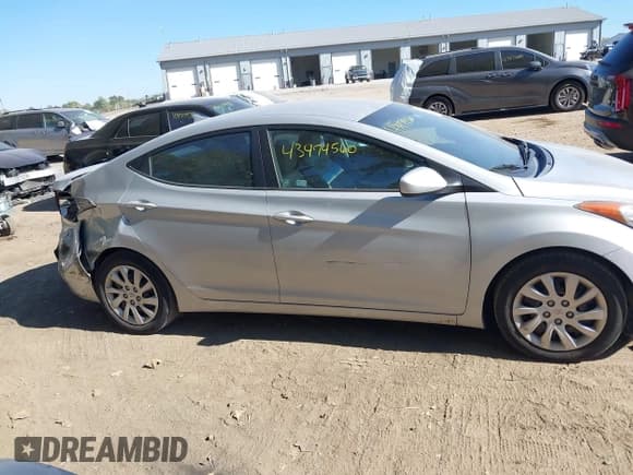 ✅ 2012 Hyundai Elantra GLS • VIN: 5NPDH4AE9CH089974 • Lot: 43474560. Listed on IAAI with 174,190 mi. Free auction sales archive from the USA and detailed vehicle history report at DreamBid. Image 13.
