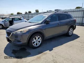 ✅ 2013 Mazda CX-9 Sport • VIN: JM3TB2BV8D0404527 • Lot: 64975915. Wystawiony na Copart z przebiegiem 156 533 mil. Bezpłatny archiwum sprzedaży aukcyjnych z USA i szczegółowy raport historii pojazdu na DreamBid. Zdjęcie 1.
