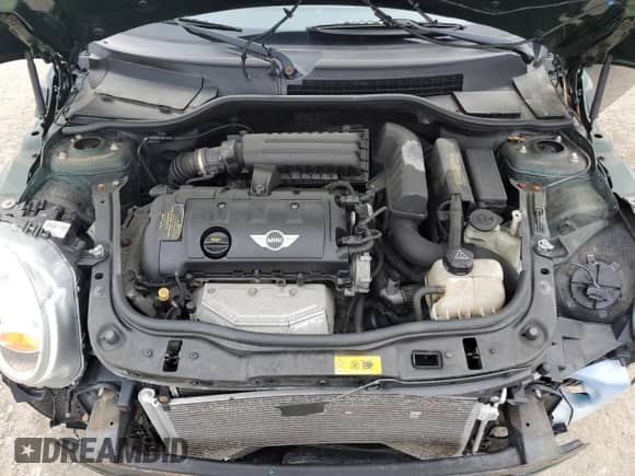 2012 MINI Hardtop with VIN WMWSU3C51CT259005, listed as a Copart auction lot 60710015 with 84,218 mi miles and Salvage title. Bid and sale history available at DreamBid. Image 11.