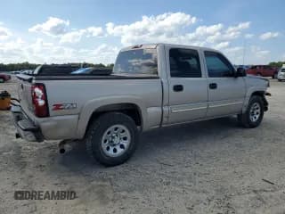 ✅ 2005 Chevrolet Silverado 1500 Z71 • VIN: 2GCEK13T651141887 • Лот: 73577344. Опубликован ранее на Copart с пробегом 220 920 миль. Бесплатный доступ к архиву аукционных продаж из США и подробный отчёт об истории автомобиля на DreamBid. Изображение 3.