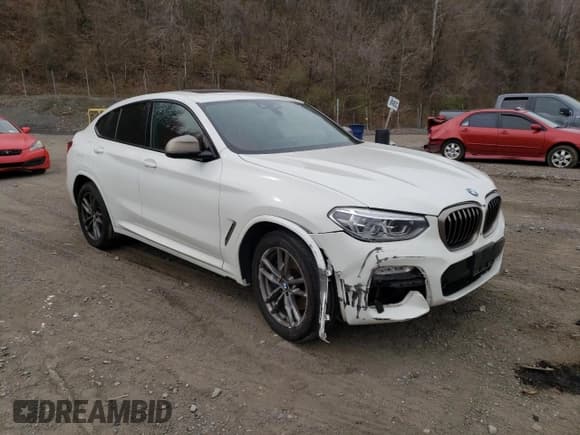 ✅ 2019 BMW X4 M40i • VIN: 5UXUJ5C58KLJ63689 • Лот: 47812373. Опубликован ранее на Copart с пробегом 37 003 миль. Бесплатный доступ к архиву аукционных продаж из США и подробный отчёт об истории автомобиля на DreamBid. Изображение 4.