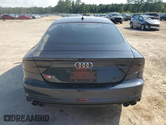 ✅ 2016 Audi S7 • VIN: WAUW2AFC7GN079947 • Лот: 65709985. Опубликован ранее на Copart с пробегом 104 064 миль. Бесплатный доступ к архиву аукционных продаж из США и подробный отчёт об истории автомобиля на DreamBid. Изображение 6.