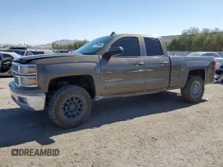 ✅ 2015 Chevrolet Silverado 1500 LT • VIN: 1GCRCREC2FZ388049 • Лот: 76098054. Опубликован ранее на Copart с пробегом 131 051 миль. Бесплатный доступ к архиву аукционных продаж из США и подробный отчёт об истории автомобиля на DreamBid. Изображение 1.