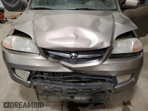 ✅ 2003 Acura MDX Touring • VIN: 2HNYD186X3H001172 • Лот: 75758224. Опубликован ранее на Copart с пробегом 316 579 миль. Бесплатный доступ к архиву аукционных продаж из США и подробный отчёт об истории автомобиля на DreamBid. Изображение 12.