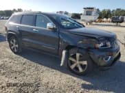 ✅ 2015 Jeep Grand Cherokee Limited • VIN: 1C4RJEBG9FC707519 • Lot: 81899855. Listed on Copart with 122,340 mi. Free auction sales archive from the USA and detailed vehicle history report at DreamBid. Image 4.