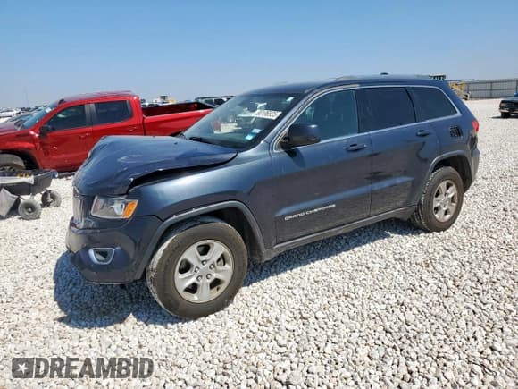 ✅ 2015 Jeep Grand Cherokee Laredo • VIN: 1C4RJEAG5FC707079 • Lot: 80196935. Listed on Copart with 157,961 mi. Free auction sales archive from the USA and detailed vehicle history report at DreamBid. Image 1.