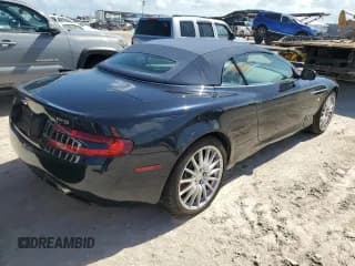 ✅ 2009 Aston Martin DB9 • VIN: SCFAD02E79GB10991 • Lot: 75089204. Listed on Copart with Not provided. Free auction sales archive from the USA and detailed vehicle history report at DreamBid. Image 3.