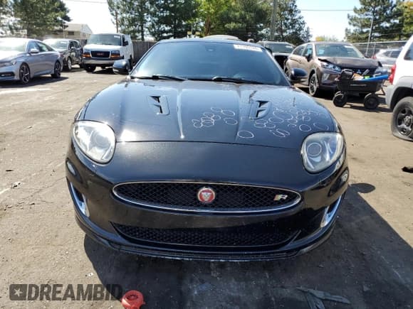 ✅ 2014 Jaguar XK XKR • VIN: SAJWA4DC6EMB53957 • Lot: 71195744. Wystawiony na Copart z przebiegiem 44 054 mil. Bezpłatny archiwum sprzedaży aukcyjnych z USA i szczegółowy raport historii pojazdu na DreamBid. Zdjęcie 5.