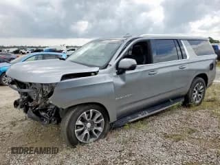 ✅ 2023 Chevrolet Suburban LT • VIN: 1GNSCCKD5PR308814 • Lot: 61955315. Wystawiony na Copart z przebiegiem 33 659 mil. Bezpłatny archiwum sprzedaży aukcyjnych z USA i szczegółowy raport historii pojazdu na DreamBid. Zdjęcie 1.