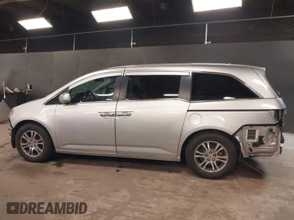 ✅ 2012 Honda Odyssey EX-L • VIN: 5FNRL5H67CB048962 • Lot: 42286708. Listed on IAAI with 131,403 mi. Free auction sales archive from the USA and detailed vehicle history report at DreamBid. Image 15.