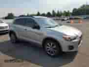 2013 Mitsubishi Outlander LE with VIN 4A4AR5AU1DE022535, listed as a Copart auction lot 70002895 with 297,561 mi miles and Salvage title. Bid and sale history available at DreamBid. Image 4.