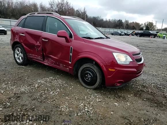 2014 Chevrolet Captiva Sport LT z VIN 3GNAL3EK4ES608344, wystawiony jako Copart lot #84215024 z przebiegiem 146 211 mil mil oraz Szkoda całkowita • Salvage title. Historia ofert i sprzedaży dostępna na DreamBid. Obrazek 12.